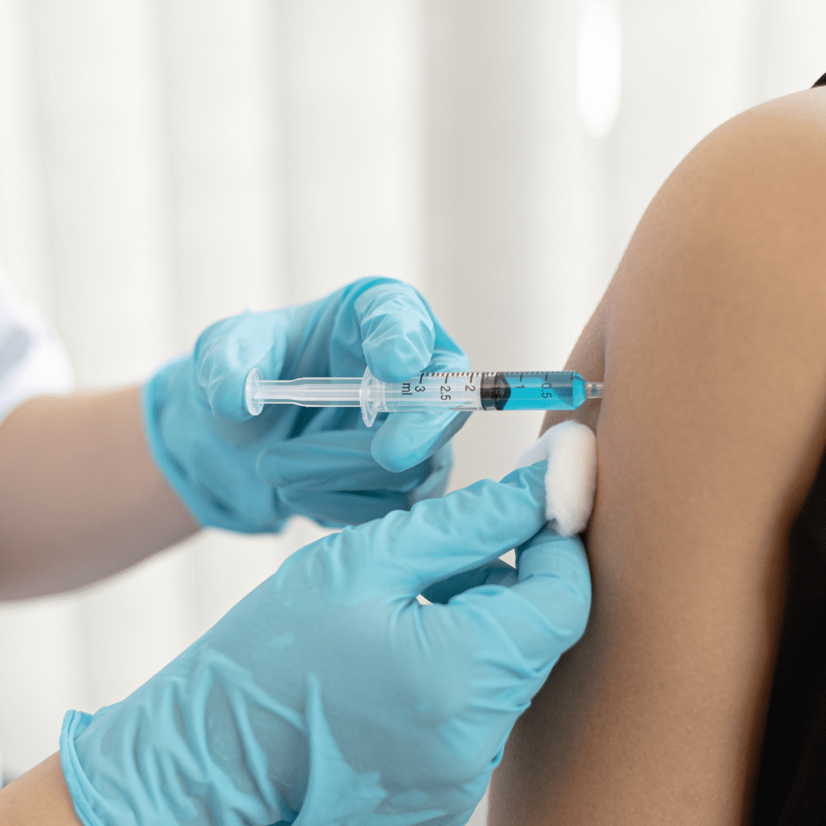 Photo of arm getting a vaccination shot
